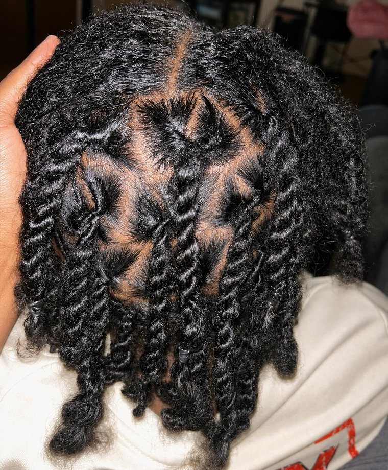 Loc retwist by Sosaa Braids